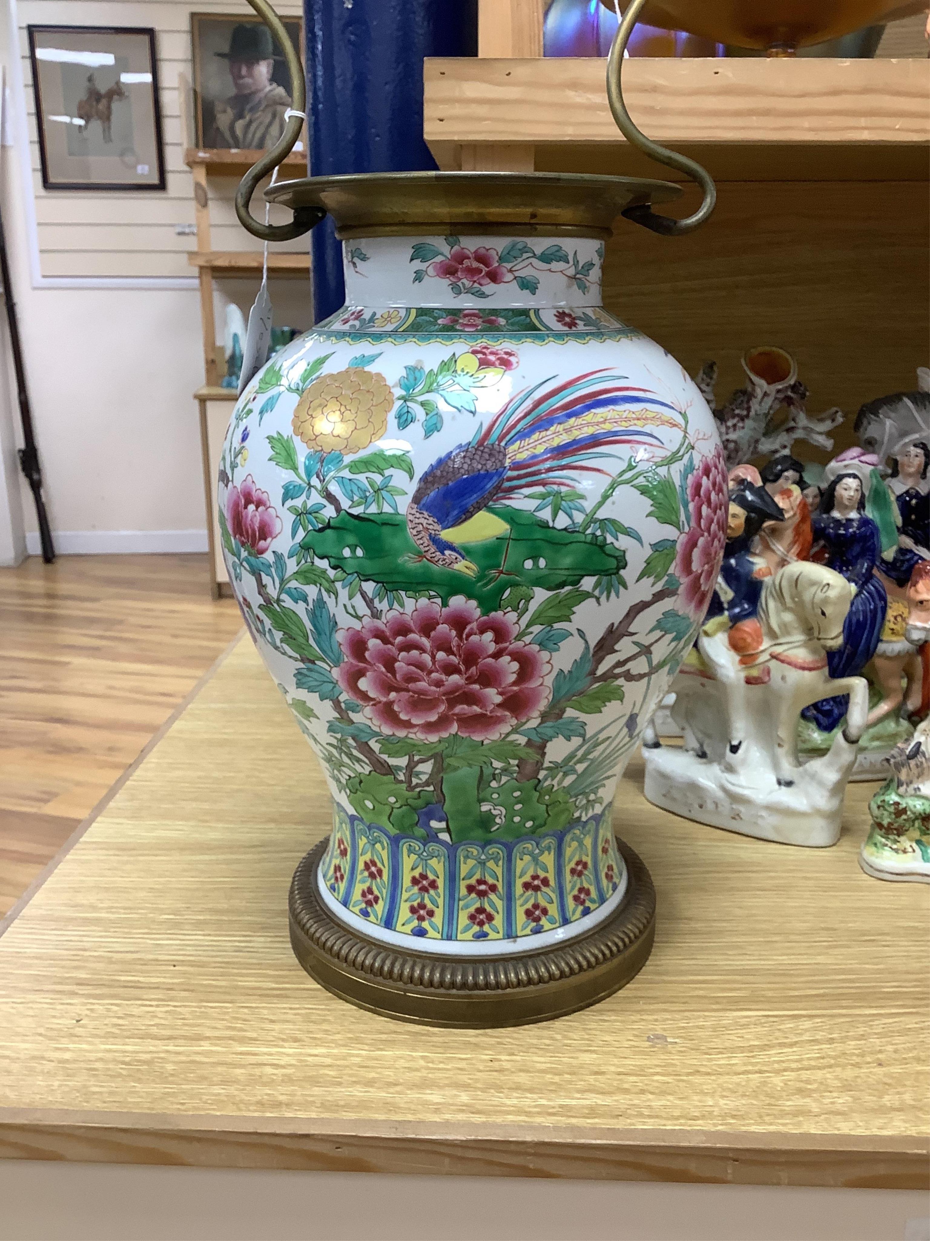 A Chinese vase and cover, converted to a two light lamp, 75cms high including fitting
